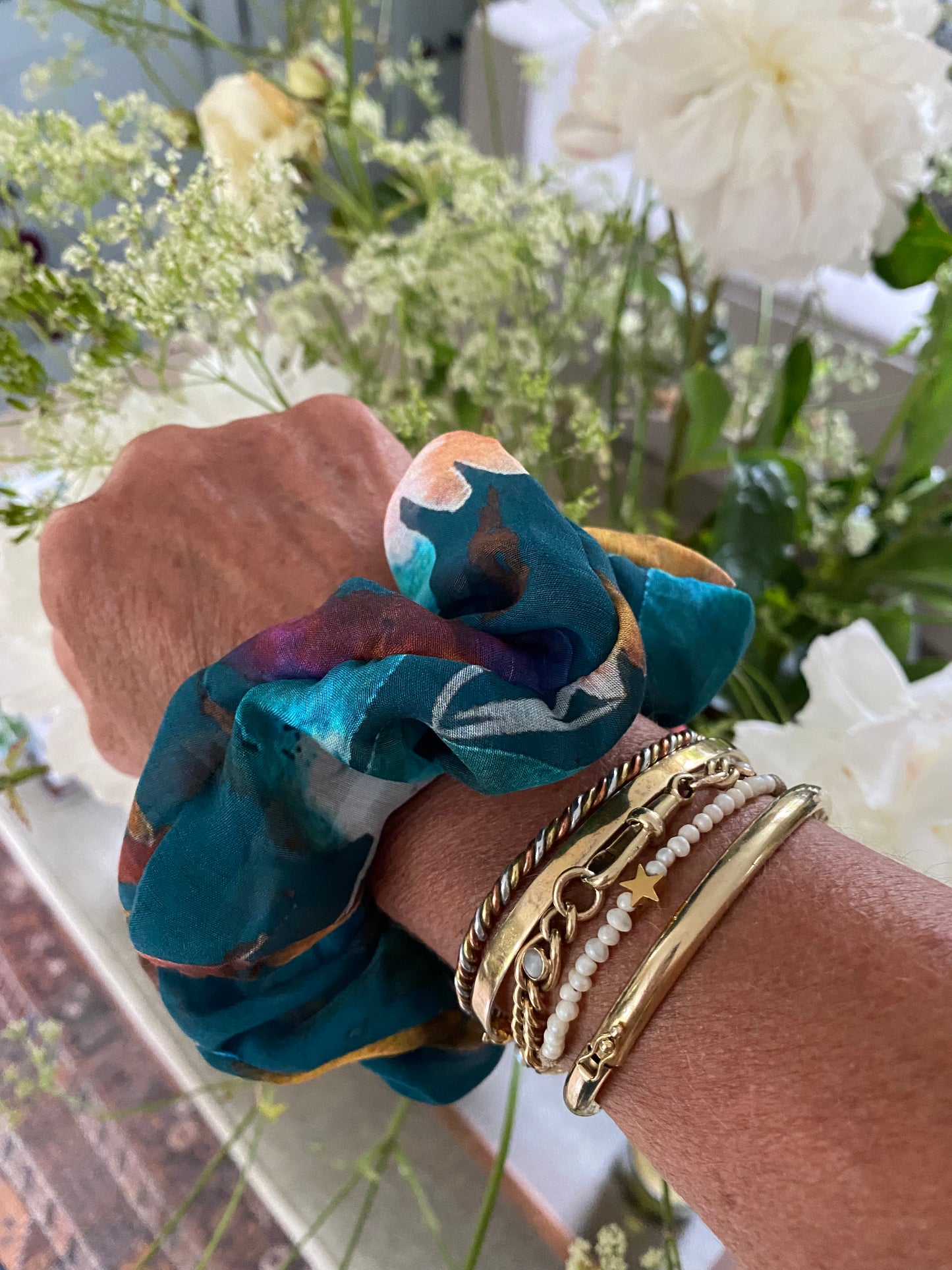 Teal silk scrunchie with splashes of pink, orange, chocolate and mauve - full