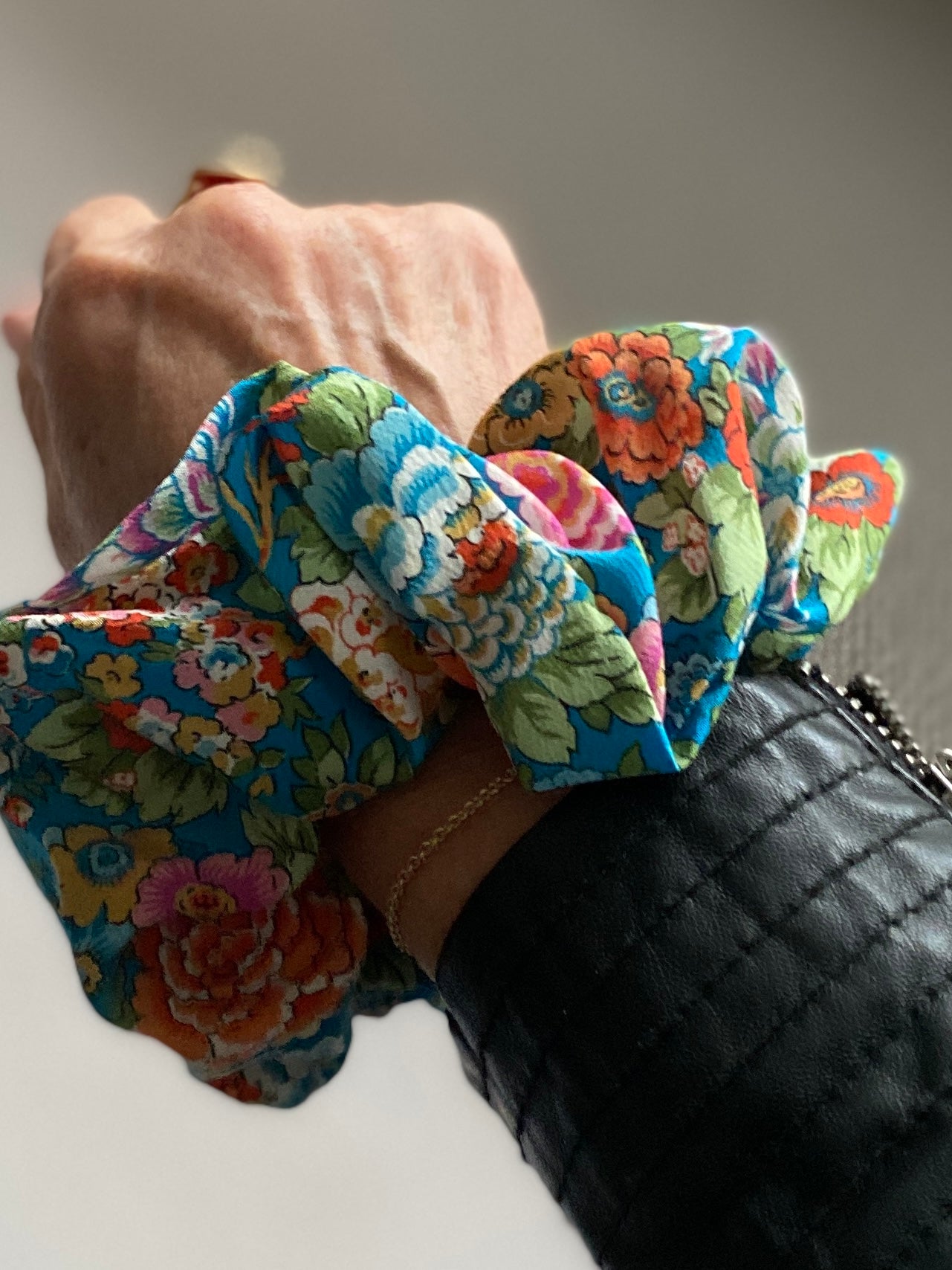Luxury floral silk scrunchie with turquoise, orange, and pink - full