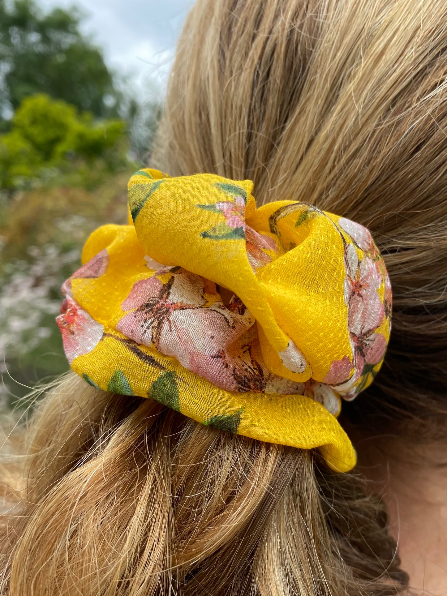 Cheerful yellow silk scrunchie with soft pink blossom - full
