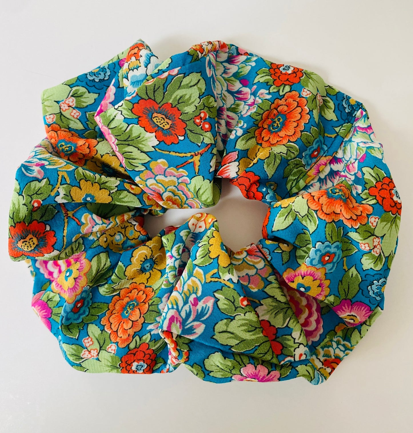 Luxury floral silk scrunchie with turquoise, orange, and pink - full