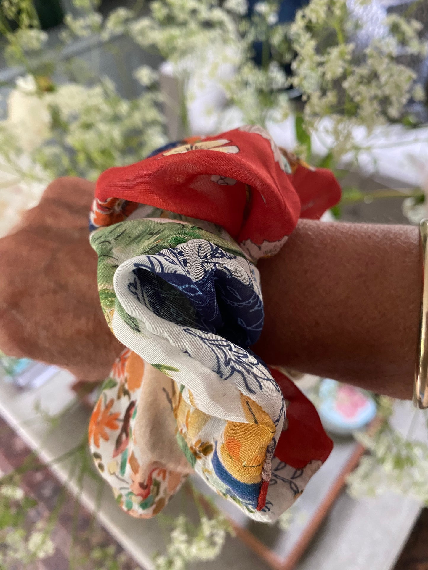 Set of two luxury silk scrunchies including a forties style patchwork and a geometric print in slim