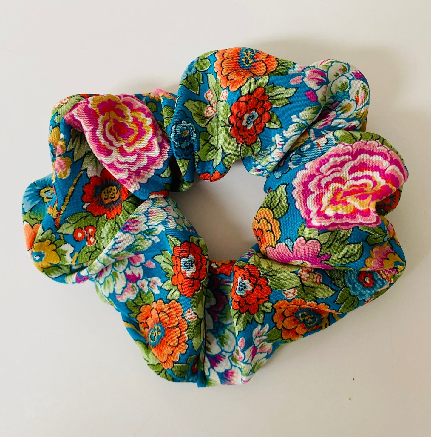 Luxury floral silk scrunchie with turquoise, orange, and pink - slim