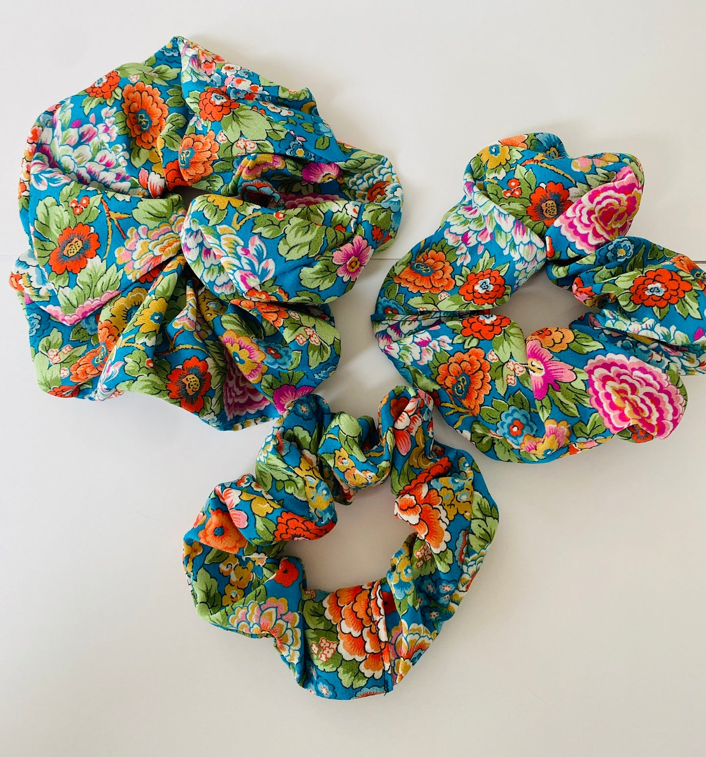 Luxury floral silk scrunchie with turquoise, orange, and pink - slim