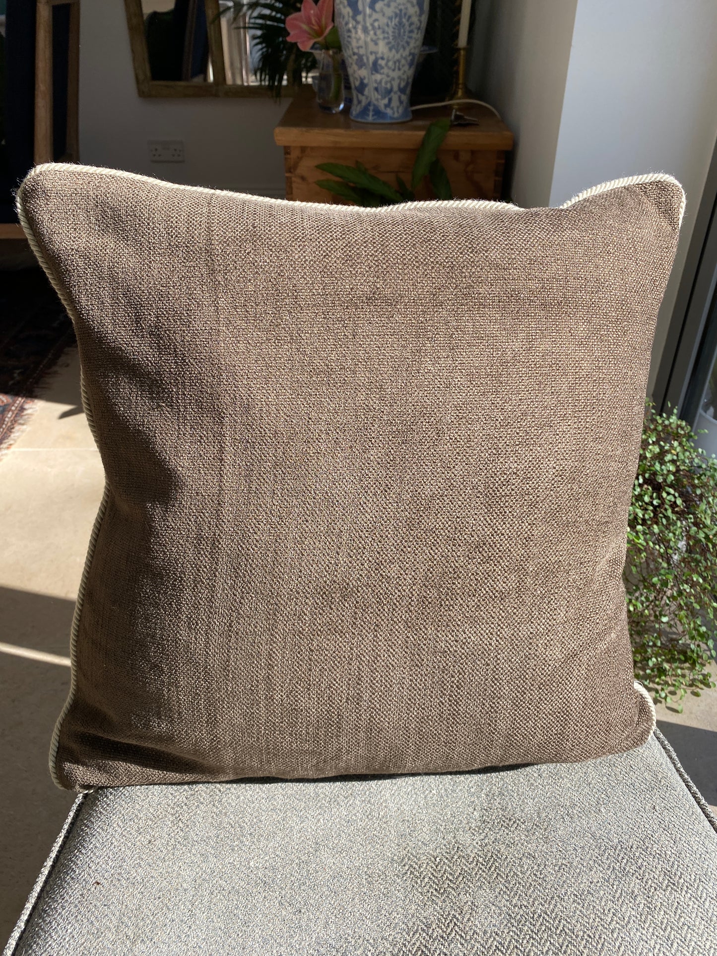 Chocolate brown woven chenille cushion with natural cord trimming