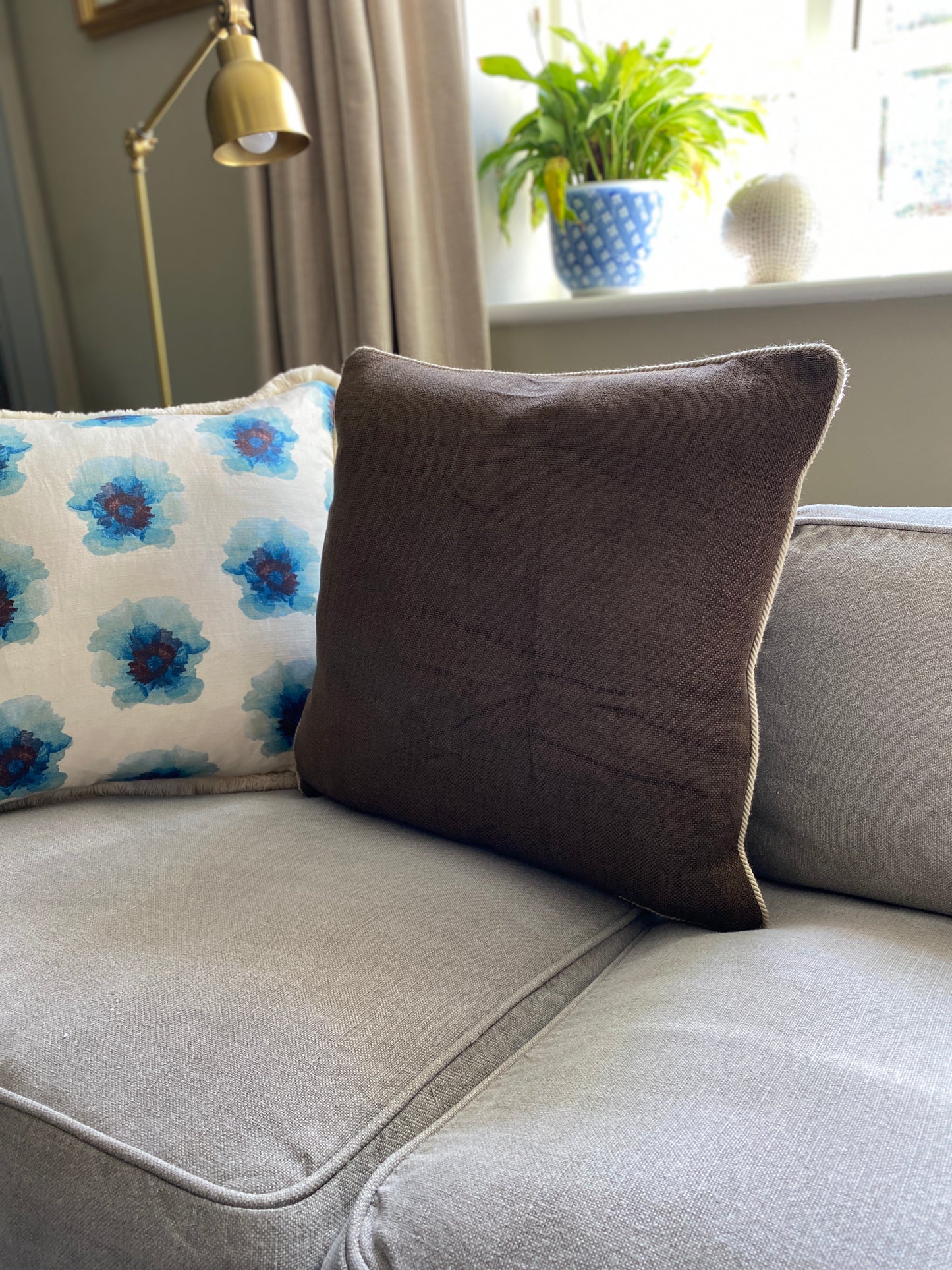 Chocolate brown woven chenille cushion with natural cord trimming