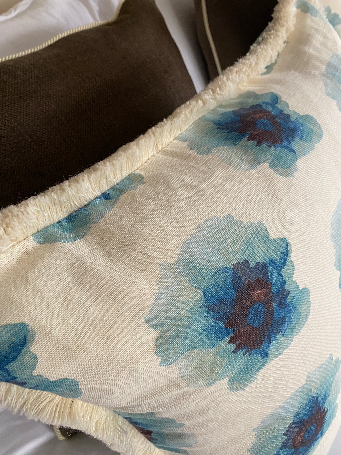 Floral linen cushion with cream fringing