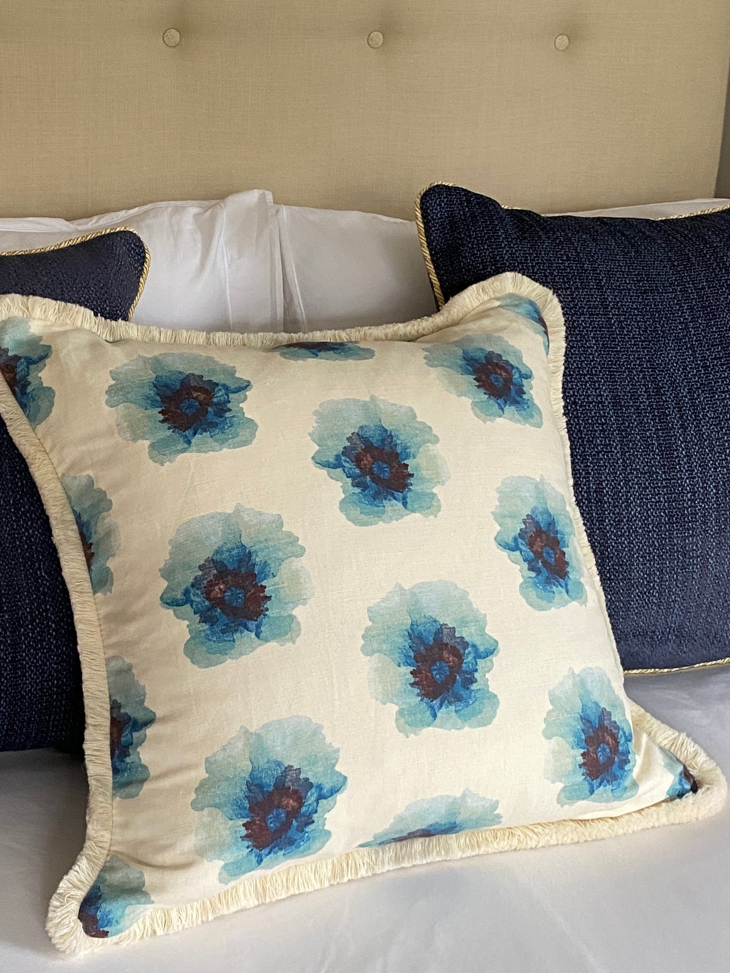 Floral linen cushion with cream fringing