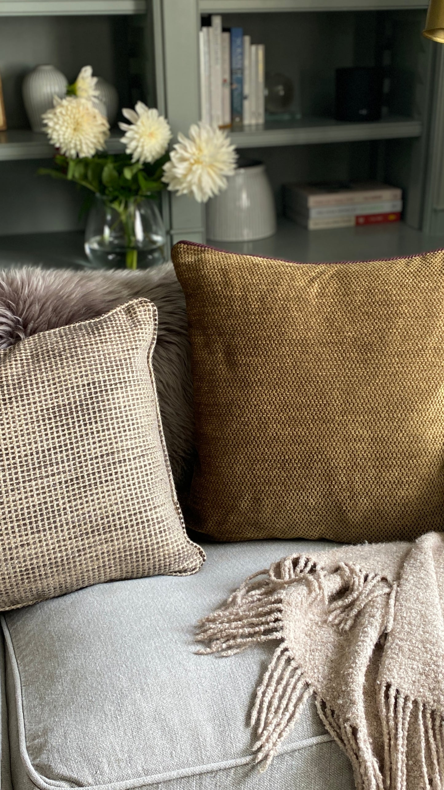 Chenille cushion in earthy browns and sand