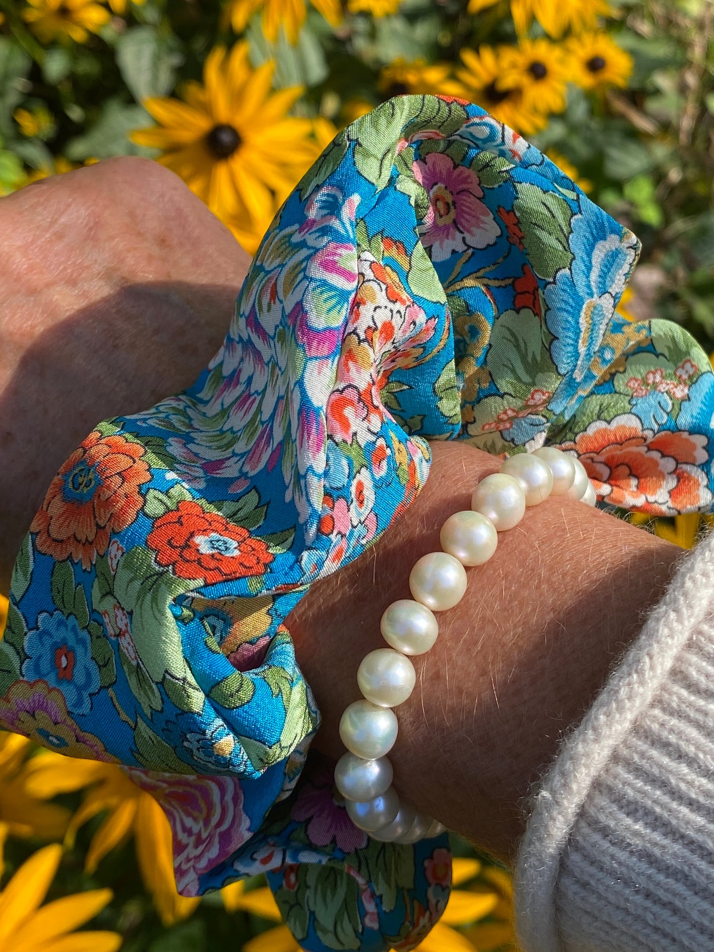 Luxury floral silk scrunchie with turquoise, orange, and pink - full