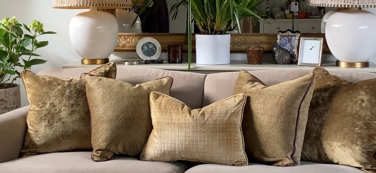 How do you style cushions on a sofa?