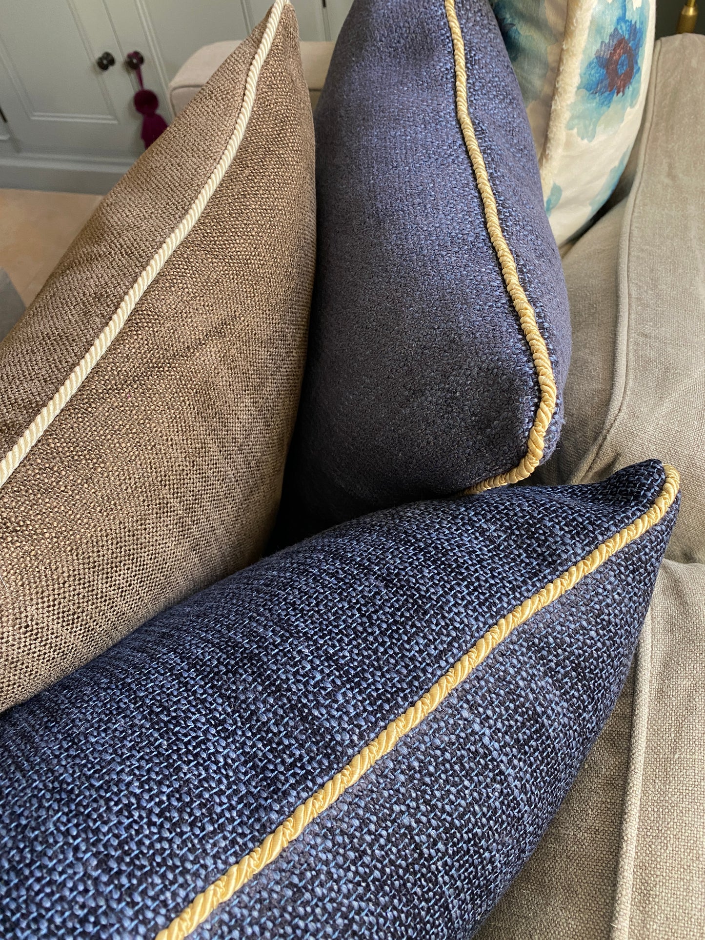 Chocolate brown woven chenille cushion with natural cord trimming