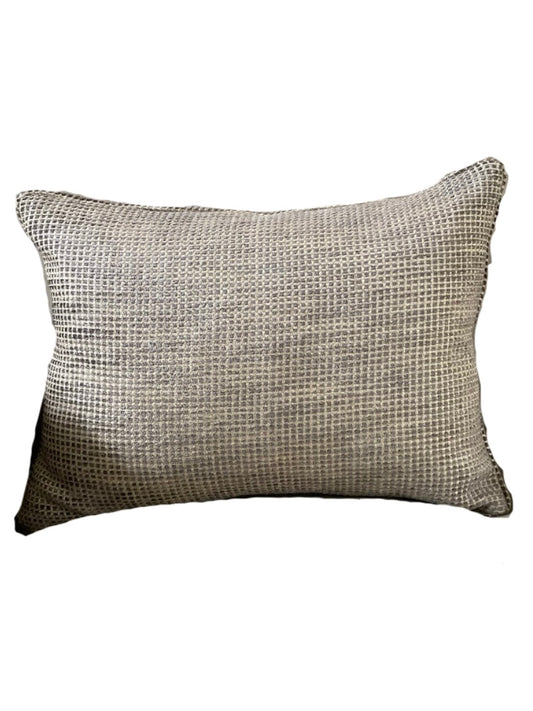 Textured chenille cushion on a white background

