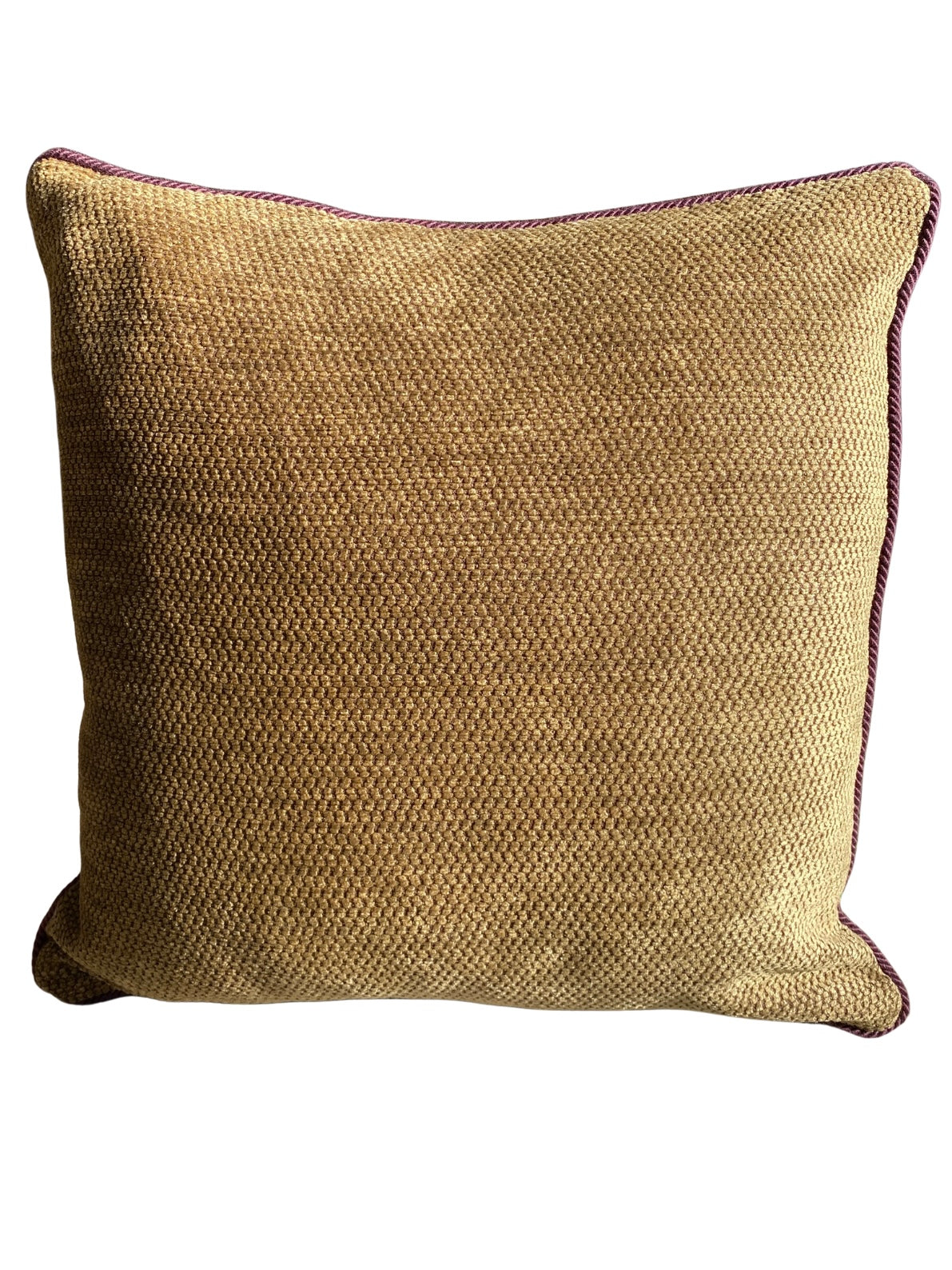 Textured burnished gold cushion with a wine cord trim on a white background