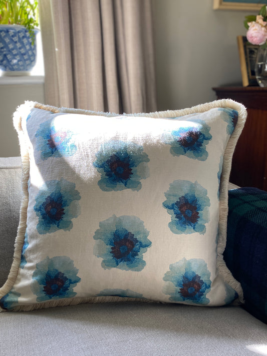 Floral linen cushion with cream fringing
