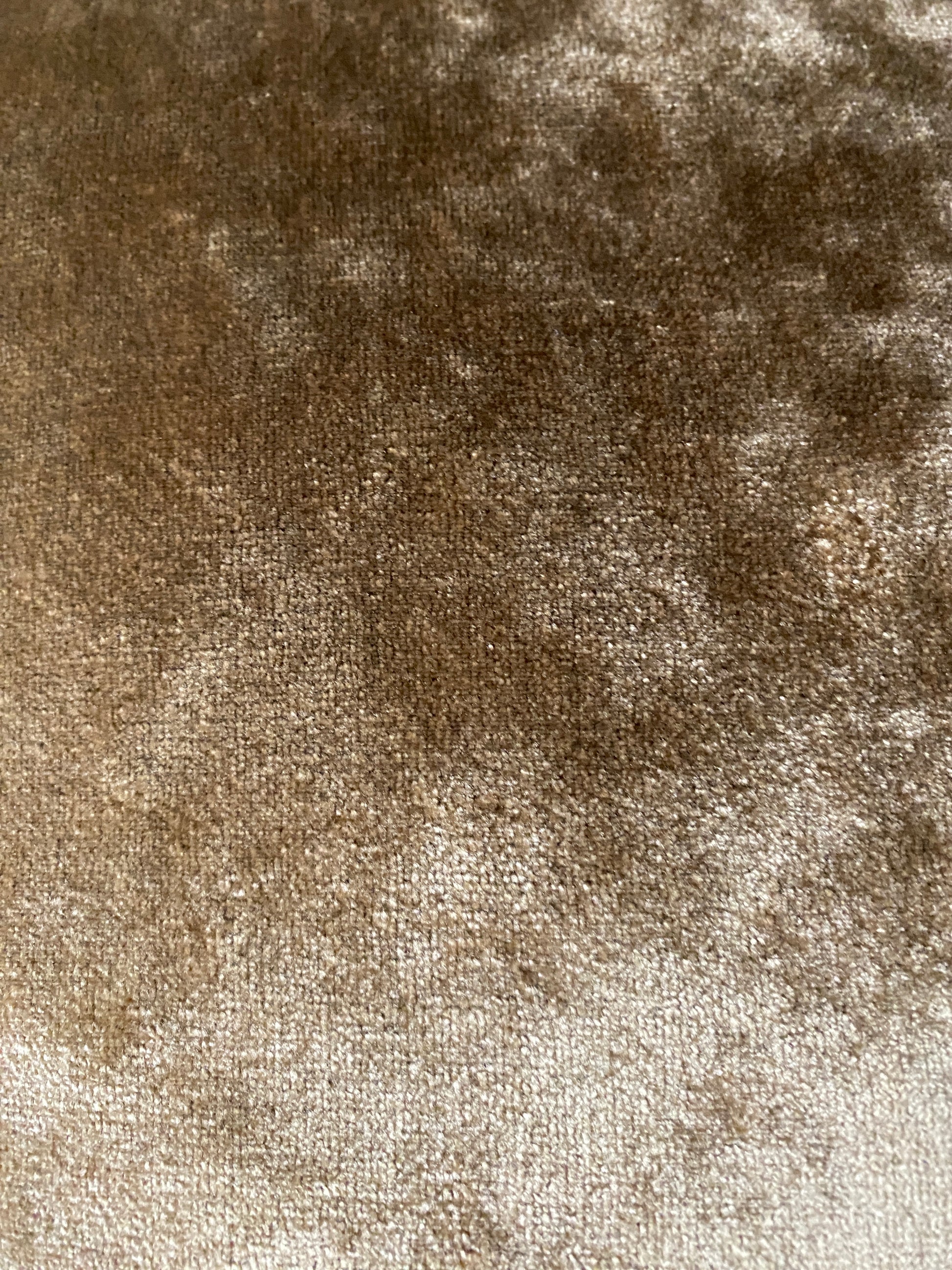 Close up of the antique gold velvet.