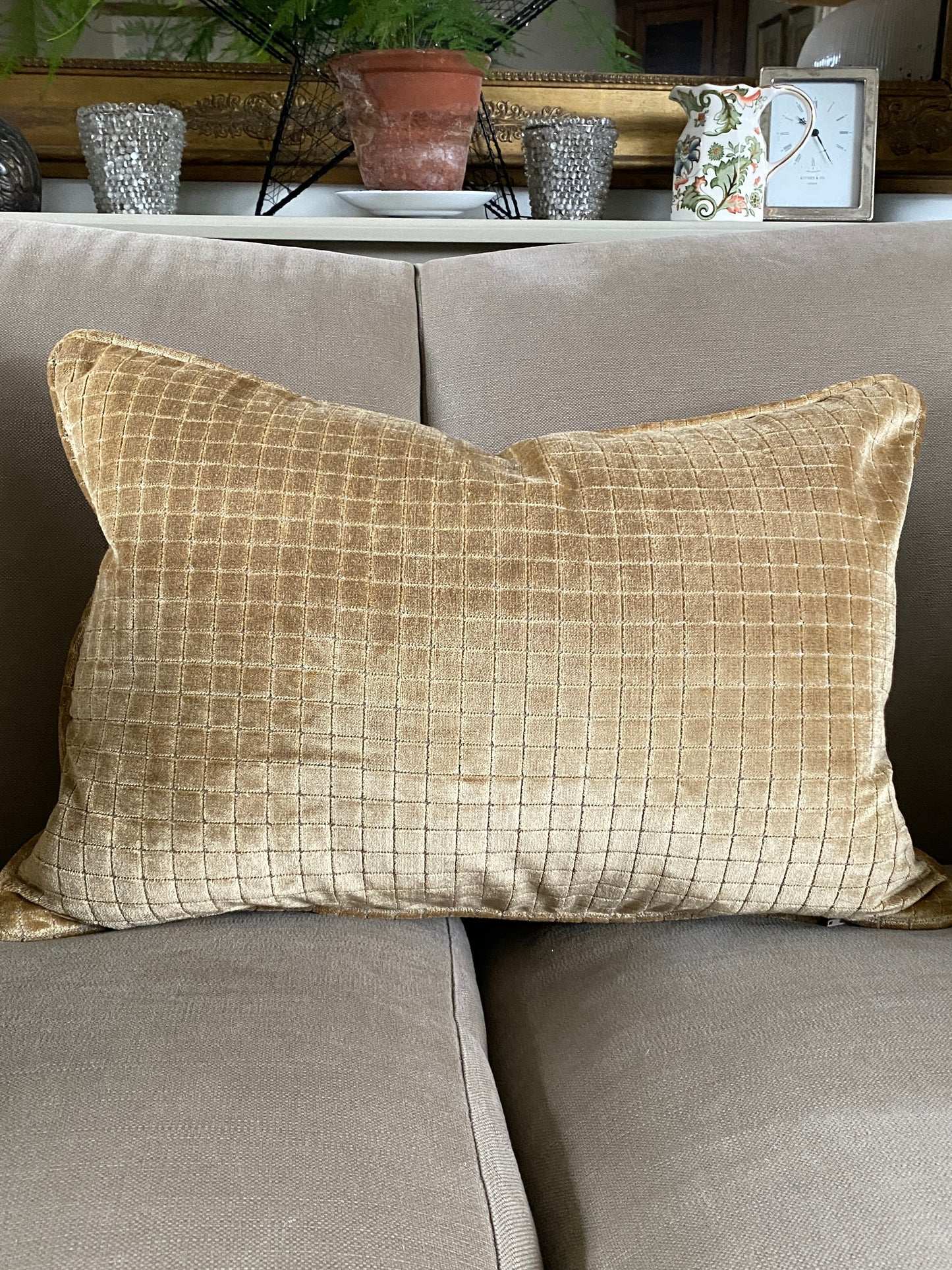 Warm gold velvet cushion