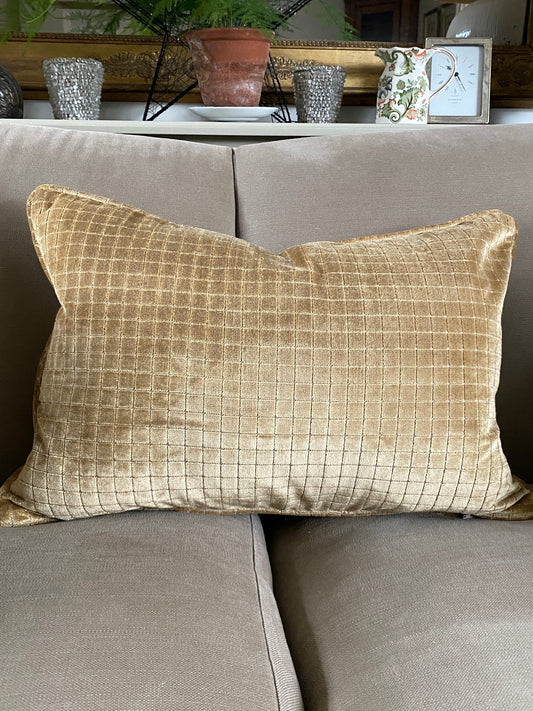 Warm gold velvet cushion