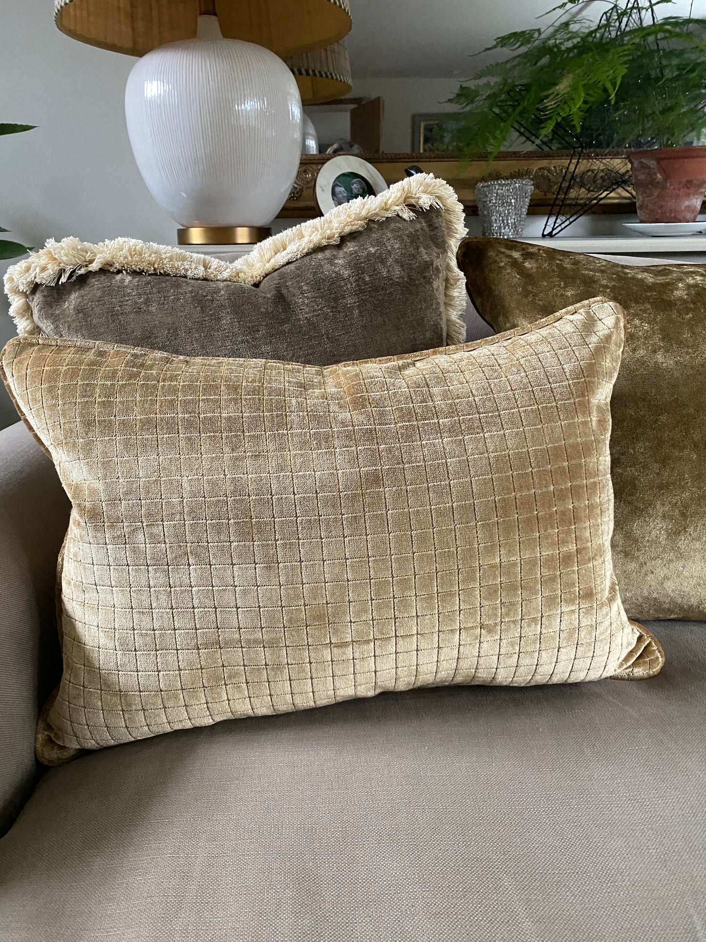 Warm gold velvet cushion
